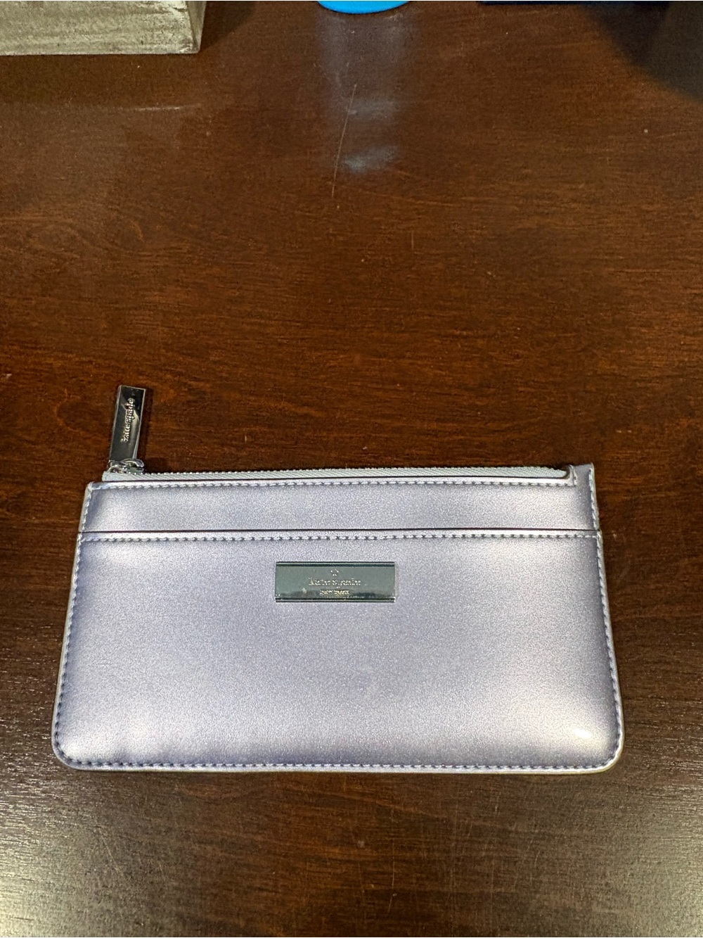 kate spade metallic lavender card zip pouch with silver plaque